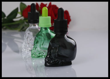 Cina Skull 30ml Botol Penetes Kaca Minyak Esensial Clear Green Black Bottle pemasok